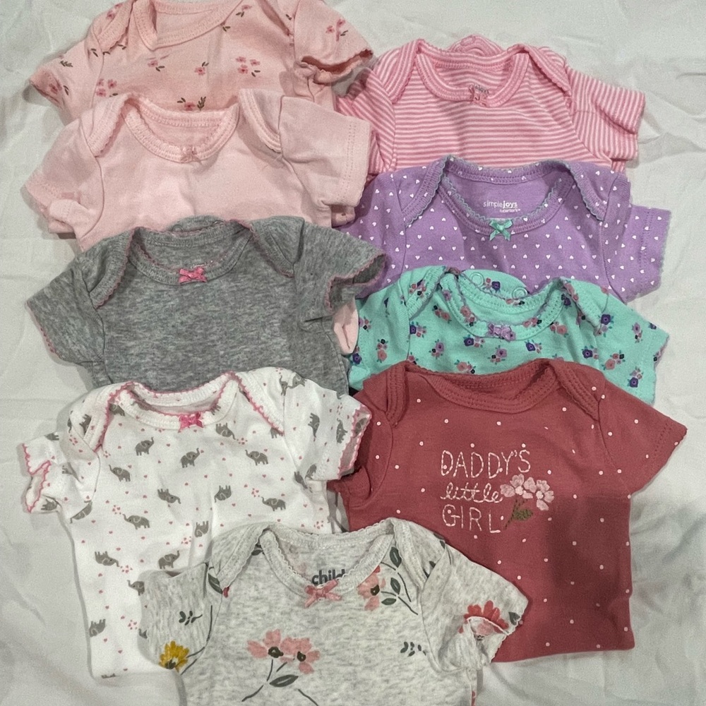 9 baby girl onesies size newborn assorted colors and patterns